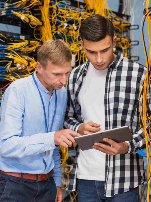 network-engineers-with-tablet-medium-shot_11zon